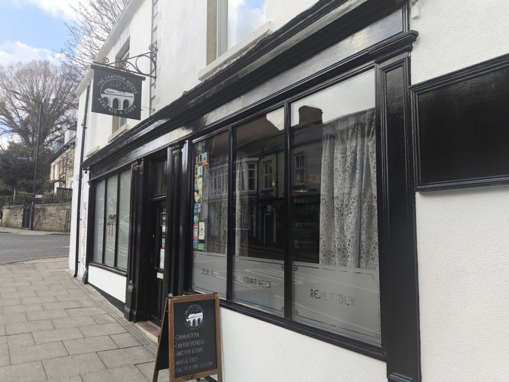 External view of the The Station House Pub and Pub sign in Durham