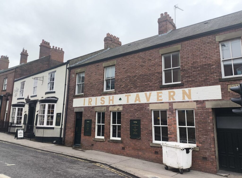Exterior of The Canny Lad pub in Sunderland with Irish Tavern graphic