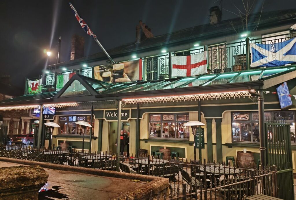 Exterior of Chaplin's pub Sunderland with home nations flags and exterior seating