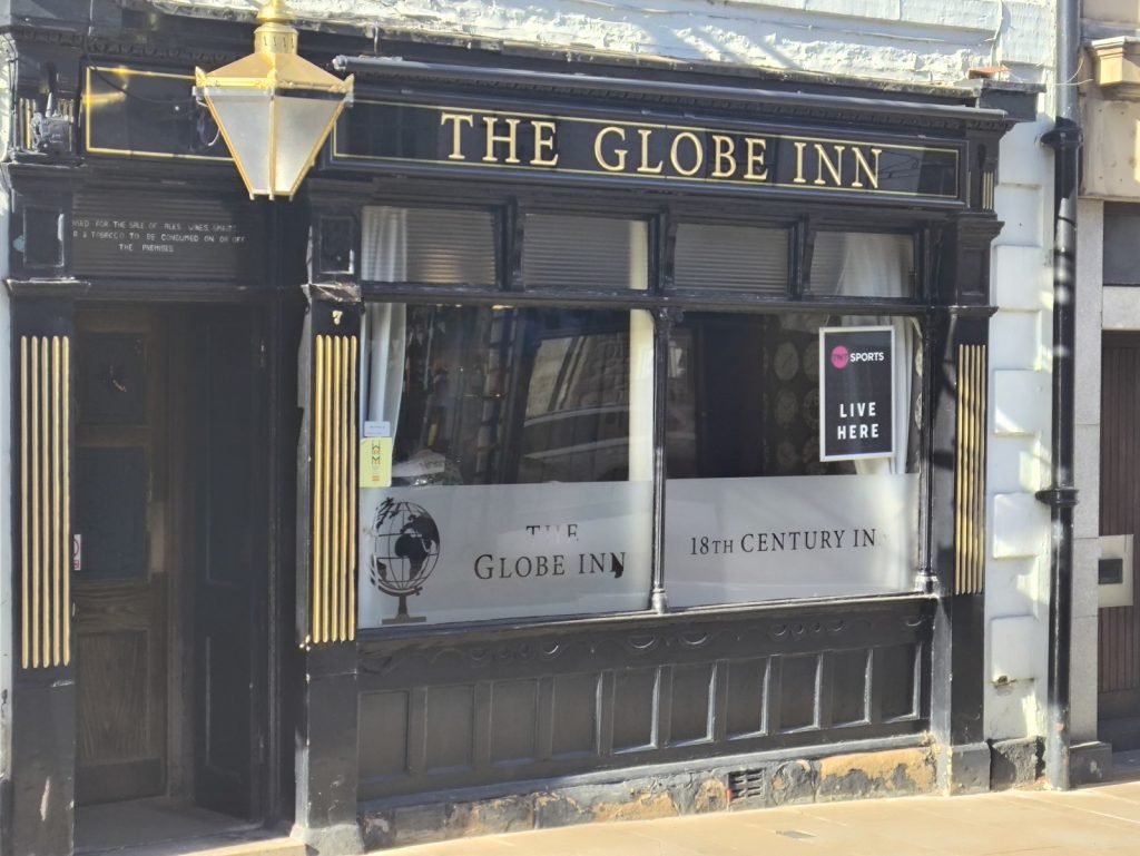 External view of The Globe pub on Battle Hill, Hexham with a traditional frontage