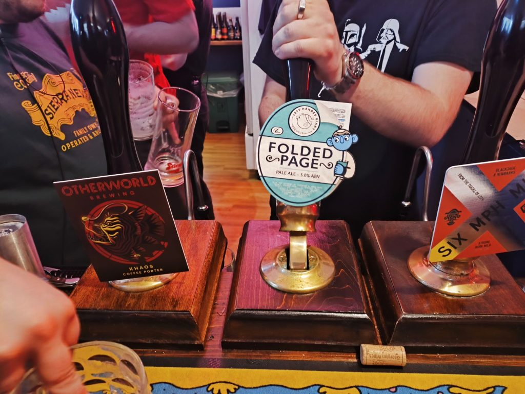 Three cask ale pumps on the bar at the Mosaic Tap Newcastle