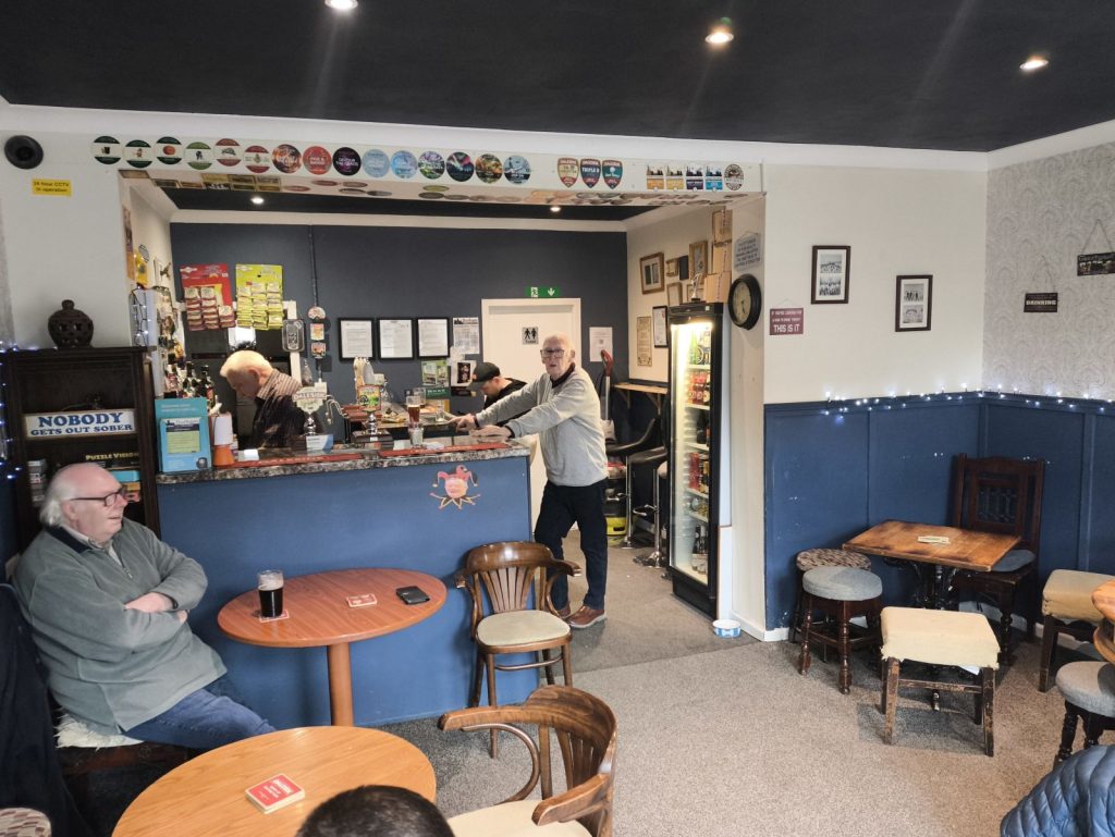 Bar and seating inside The Little Tap micropub in Spennymoor, County Durham.